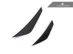 AutoTecknic G8X M3 / M4 dry carbon canard set installed on the exterior of a vehicle, showcasing aerodynamic performance.