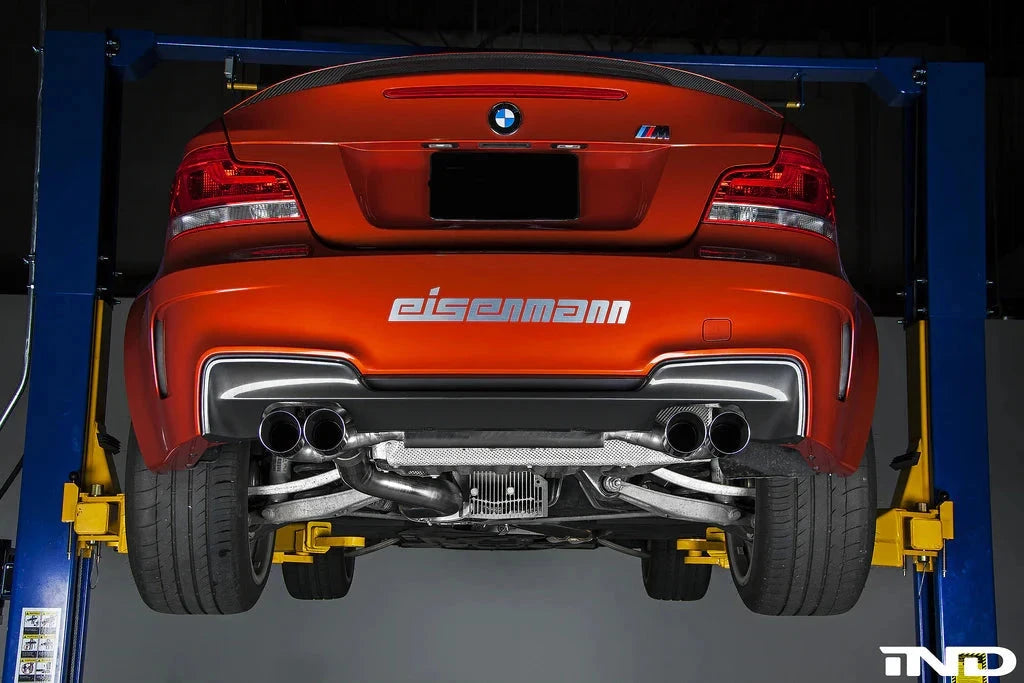 Eisenmann E82 1M performance exhaust system installed on a BMW E82 rear view showing polished exhaust tips and sleek design