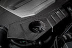 Eventuri black carbon engine cover installed on Audi C8 RS6 and RS7, showcasing sleek exterior design and high-quality craftsmanship.