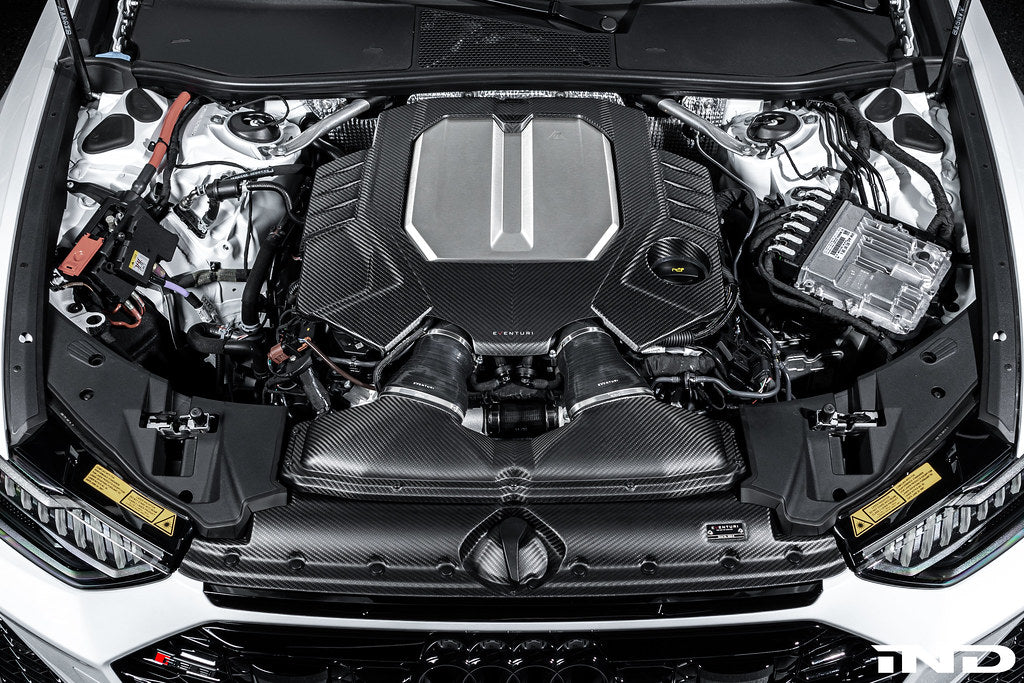 Eventuri black matte carbon engine cover installed on Audi C8 RS6 and RS7 exterior engine bay.