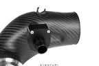 Close-up of matte carbon turbo inlet set for BMW G90 G99 M5 (S68) by Eventuri, showing detailed fitting and performance design.