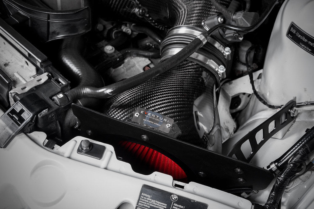 Eventuri Hybrid Carbon Airbox System installed on a BMW E36/7 Z3M featuring a prepreg carbon fiber airbox, bespoke intake system, and OEM MAF-compatible design for the S54 engine.