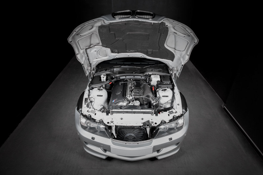 Eventuri Hybrid Carbon Airbox System installed on a BMW E36/7 Z3M featuring a prepreg carbon fiber airbox, bespoke intake system, and OEM MAF-compatible design for the S54 engine.