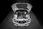 Eventuri Hybrid Carbon Airbox System installed on a BMW E36/7 Z3M featuring a prepreg carbon fiber airbox, bespoke intake system, and OEM MAF-compatible design for the S54 engine.