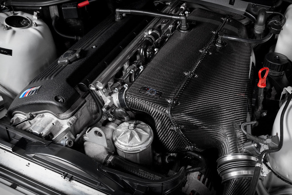 Eventuri Hybrid Carbon Airbox System installed on a BMW E36/7 Z3M featuring a prepreg carbon fiber airbox, bespoke intake system, and OEM MAF-compatible design for the S54 engine.
