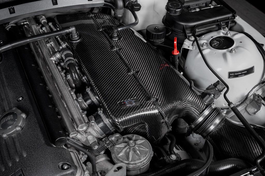 Eventuri Hybrid Carbon Airbox System installed on a BMW E36/7 Z3M featuring a prepreg carbon fiber airbox, bespoke intake system, and OEM MAF-compatible design for the S54 engine.
