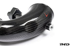Close-up of Eventuri F9X X5M X6M G09 XM M60i LCI carbon turbo inlet set with detailed fittings and performance components.