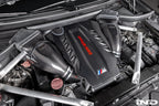 Eventuri carbon turbo inlet set installed on BMW F9X X5M, X6M, G09 XM, and M60i LCI performance vehicles, showcasing sleek carbon design