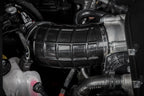 Eventuri Lotus Emira V6 black carbon intake system installed, showcasing its sleek performance design and high-quality materials.