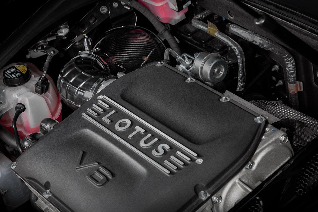 Eventuri Lotus Emira V6 black carbon intake system installed, showcasing a sleek, high-performance automotive air intake upgrade.