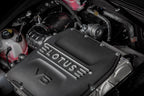 Eventuri Lotus Emira V6 black carbon intake system installed, showcasing a sleek, high-performance automotive air intake upgrade.