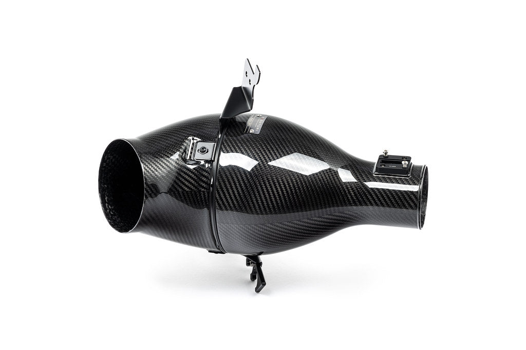 Eventuri Lotus Emira V6 black carbon intake system for performance, shown on white background.