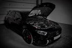 Eventuri black carbon intake system installed in a Mercedes AMG A45 and CLA45, showcasing high-performance automotive parts.