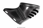 Eventuri black carbon intake system installed in a Mercedes AMG A45 CLA45, showcasing its performance air intake duct design.