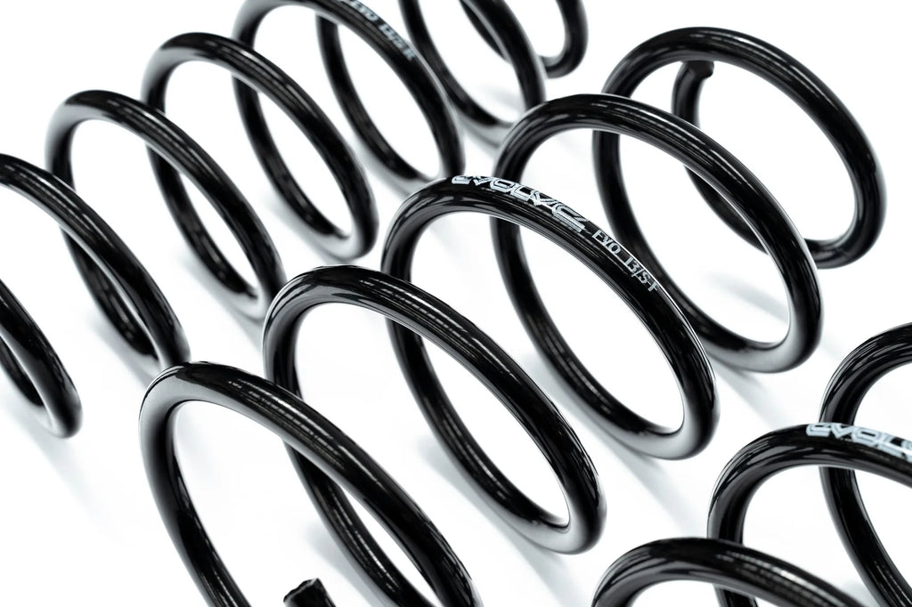 Evolve I01 i3 i3S Lowering Springs shown on a white background, engineered to lower the BMW i3, i3S, and Range Extender while maintaining ride comfort and everyday drivability.