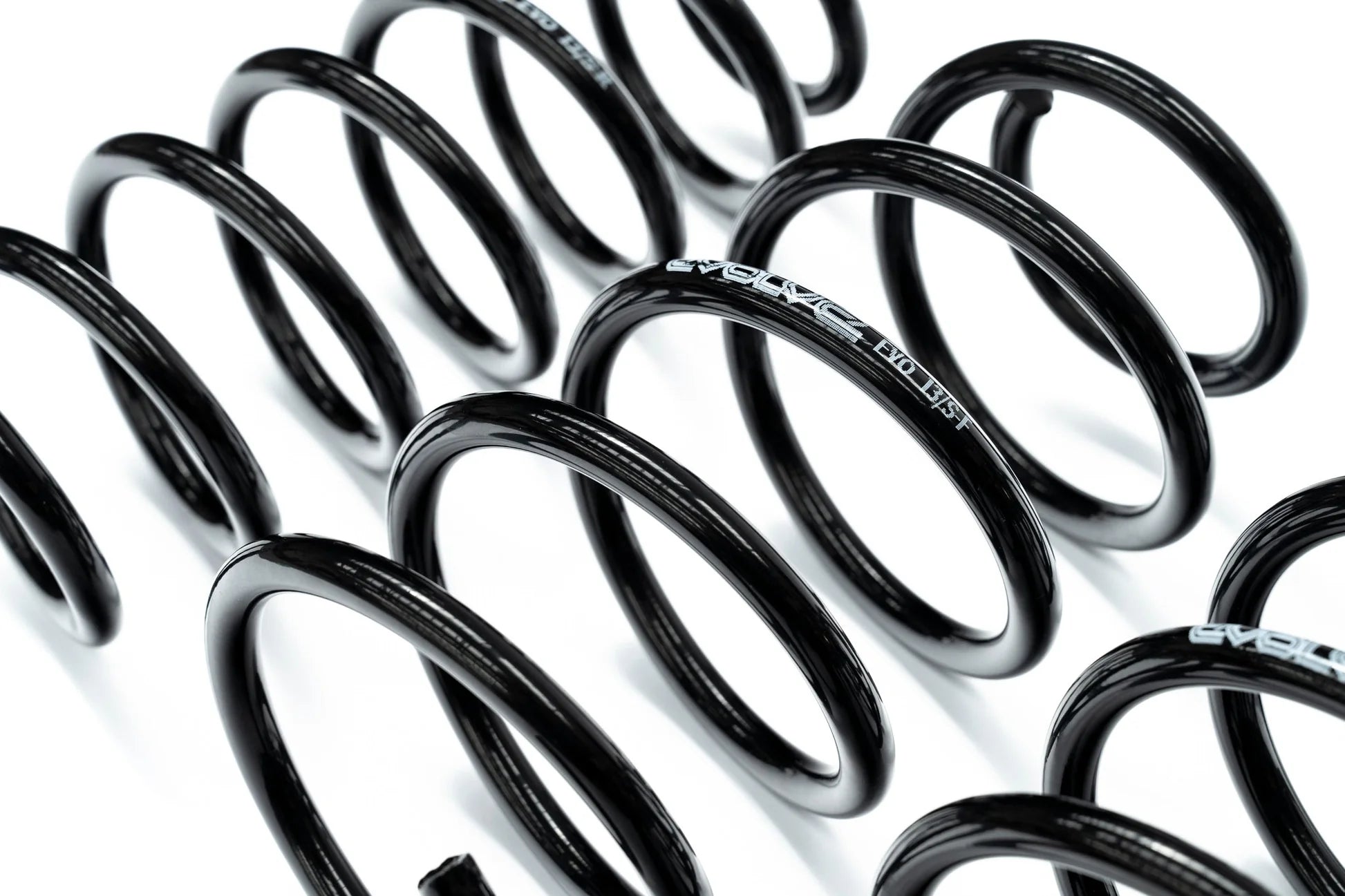 Evolve I01 i3 i3S Lowering Springs shown on a white background, engineered to lower the BMW i3, i3S, and Range Extender while maintaining ride comfort and everyday drivability.