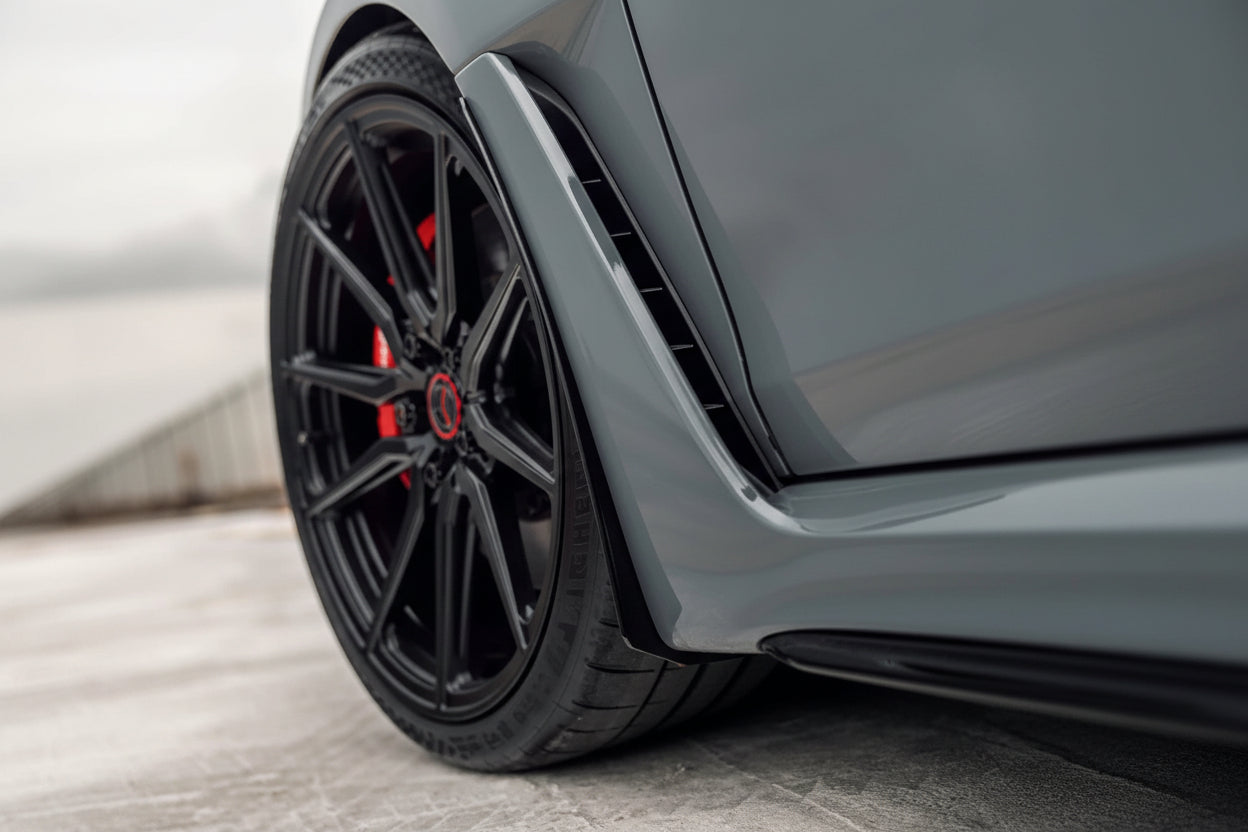 Megachip FL5 Civic Type-R exterior splash guard set installed on car, showing black plastic mudflaps on wheel arches.