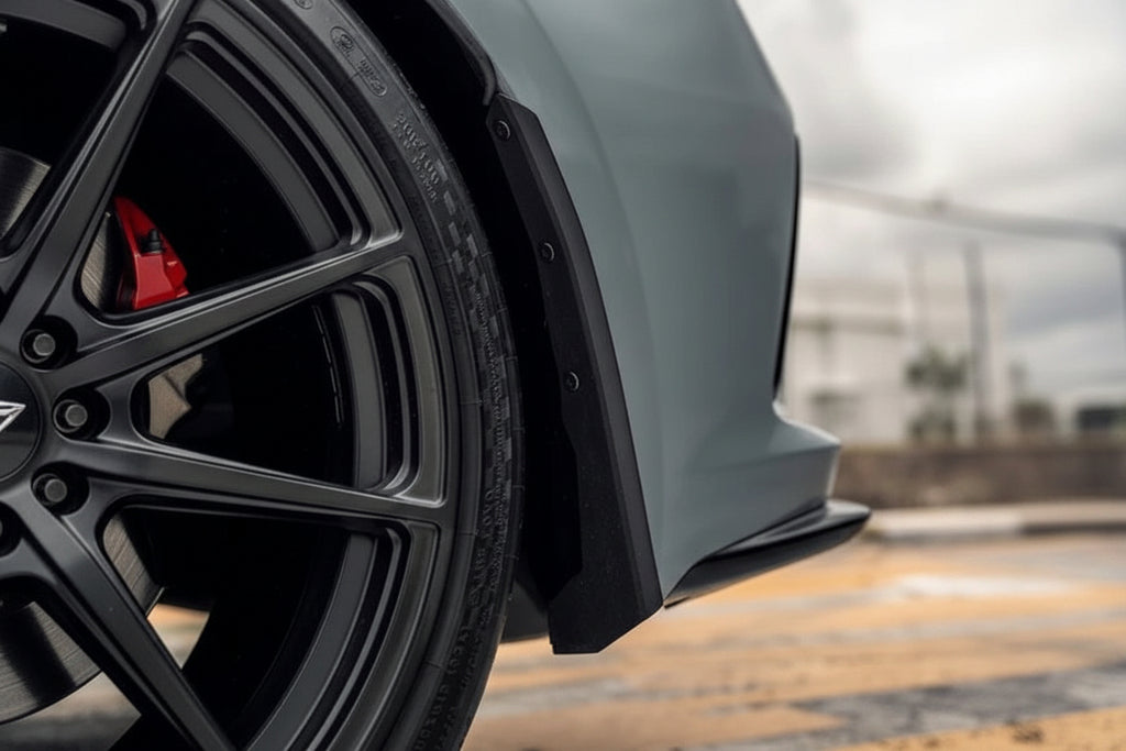 Megachip FL5 Civic Type-R splash guard set installed on the exterior, showing black protective guards on the wheel arches.