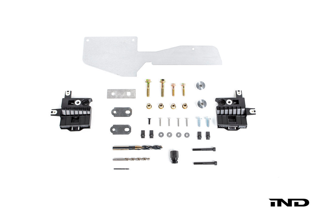 Fall-Line Motorsports oil cooler guard hardware for BMW G8X M2, M3, and M4 shown on a white background, designed to help protect the factory oil cooler from road debris and track hazards.