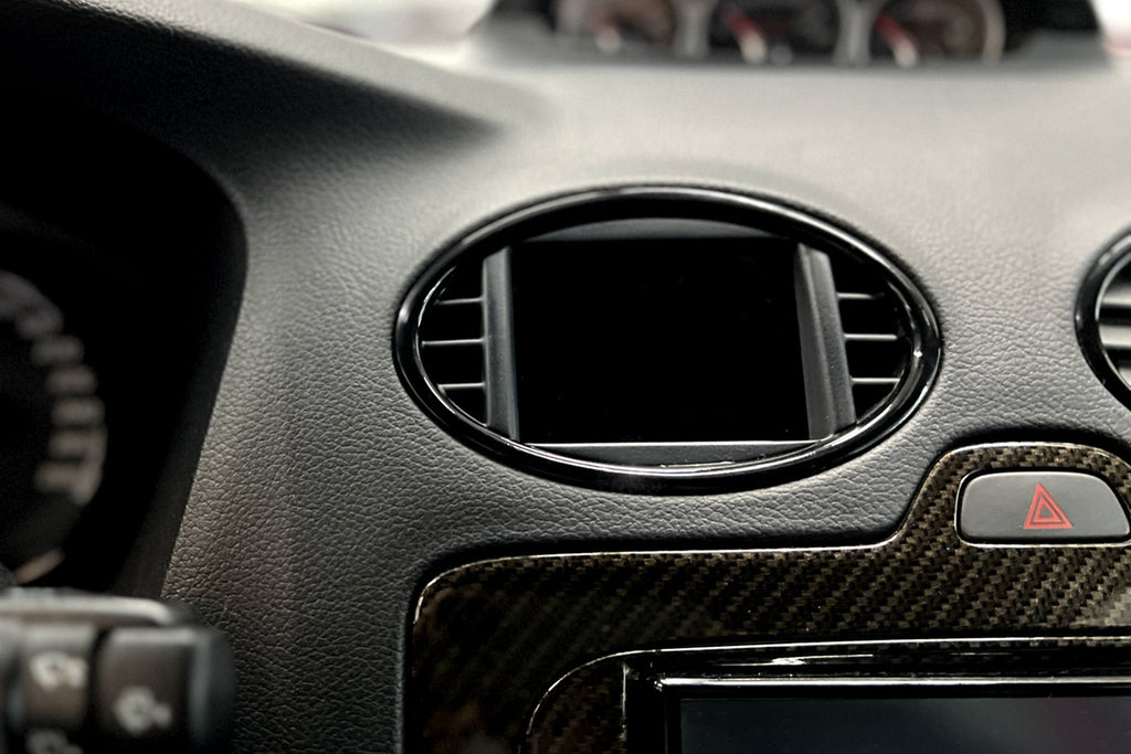 CANchecked MFD28 Gen2 2.8-inch multi-function display installed in a Ford MK2 Focus, compatible with left-hand drive and right-hand drive models, featuring a vehicle-specific dashboard integration.