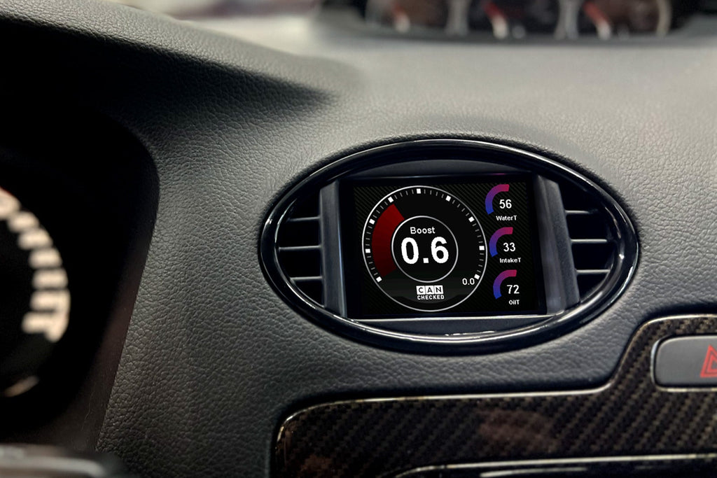 CANchecked MFD28 Gen2 2.8-inch multi-function display installed in a Ford MK2 Focus, compatible with left-hand drive and right-hand drive models, featuring a vehicle-specific dashboard integration.
