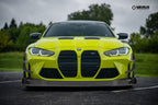Verus Engineering G8x M3 M4 carbon polyweave front splitter kit on a BMW M4 exterior body with aerodynamic design.