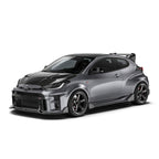 ADRO Toyota GR Yaris exterior carbon fiber side skirts installed on the vehicle, showcasing a sleek, aerodynamic design.