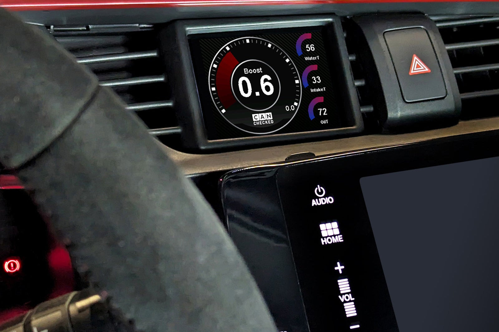 CANchecked MFD32 Gen2 3.2-inch multi-function display installed in a left-hand drive Honda FK8 Civic, featuring a vehicle-specific dashboard integration.