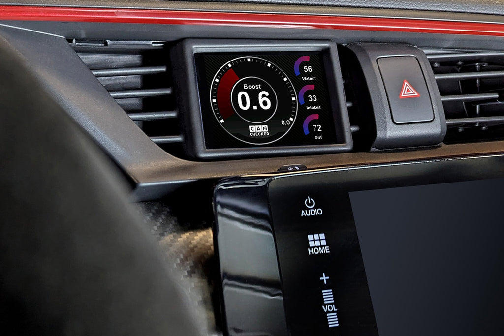 CANchecked MFD32 Gen2 3.2-inch multi-function display installed in a left-hand drive Honda FK8 Civic, featuring a vehicle-specific dashboard integration.
