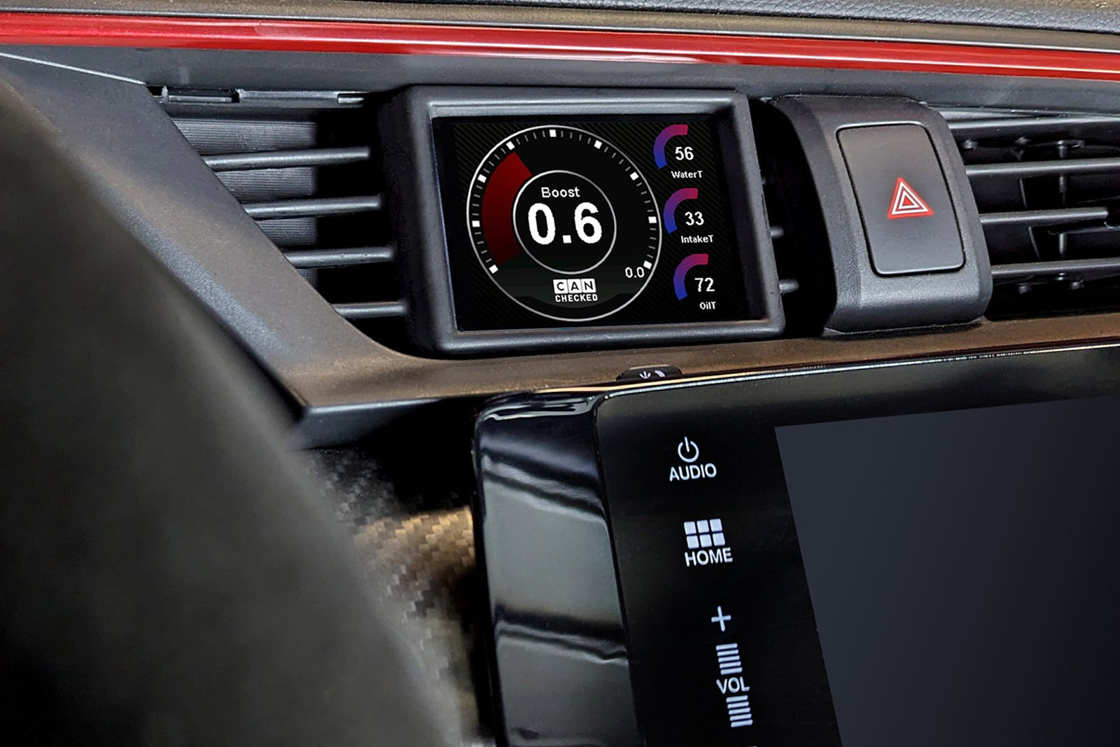 CANchecked MFD32 Gen2 3.2-inch multi-function display installed in a left-hand drive Honda FK8 Civic, featuring a vehicle-specific dashboard integration.