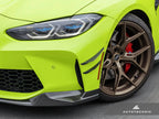 AutoTecknic G8X M3 M4 dry carbon canard set installed on exterior of a car, showcasing lightweight aerodynamic design.