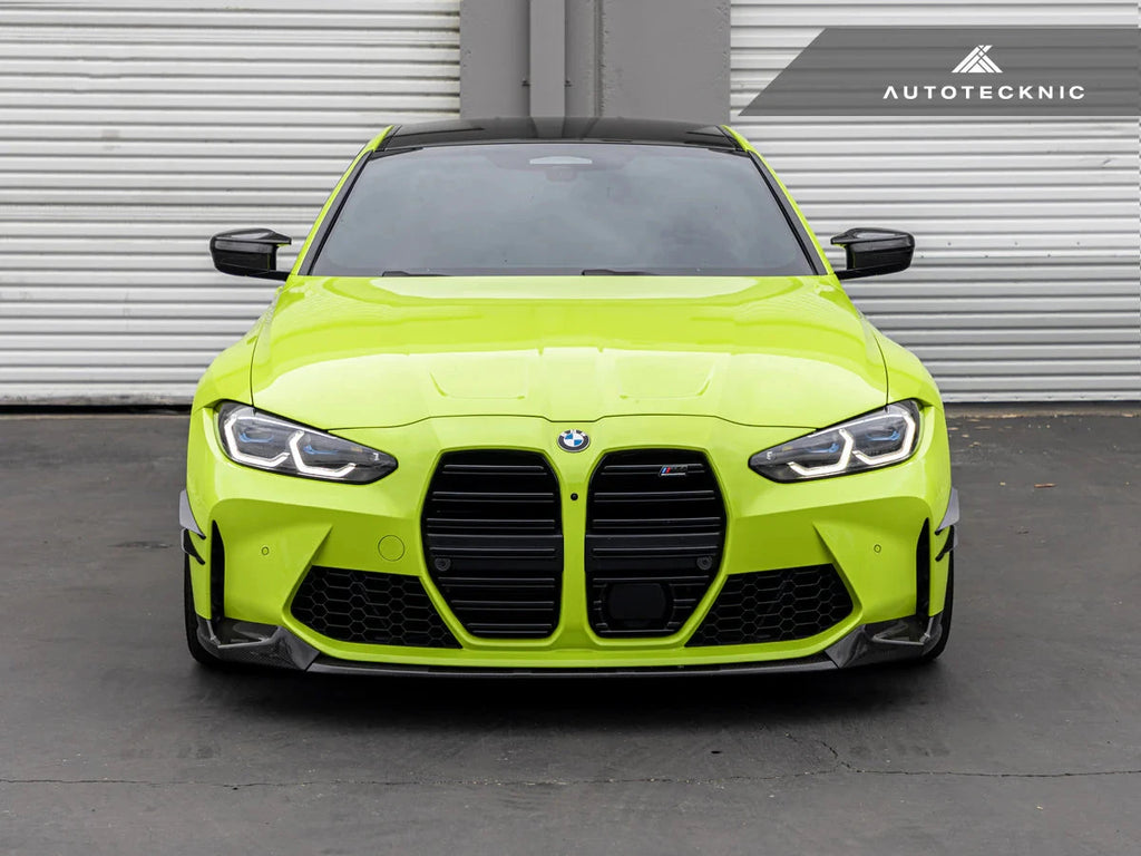 AutoTecknic G8X M3 M4 dry carbon canard set for exterior upgrade, featuring sleek black aerodynamic canards on a car.