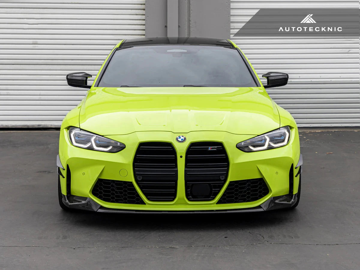 AutoTecknic G8X M3 M4 dry carbon canard set for exterior upgrade, featuring sleek black aerodynamic canards on a car.