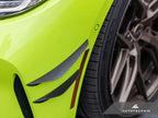 AutoTecknic G8X M3/M4 dry carbon canard set installed on an exterior car, showcasing lightweight aerodynamic enhancements.