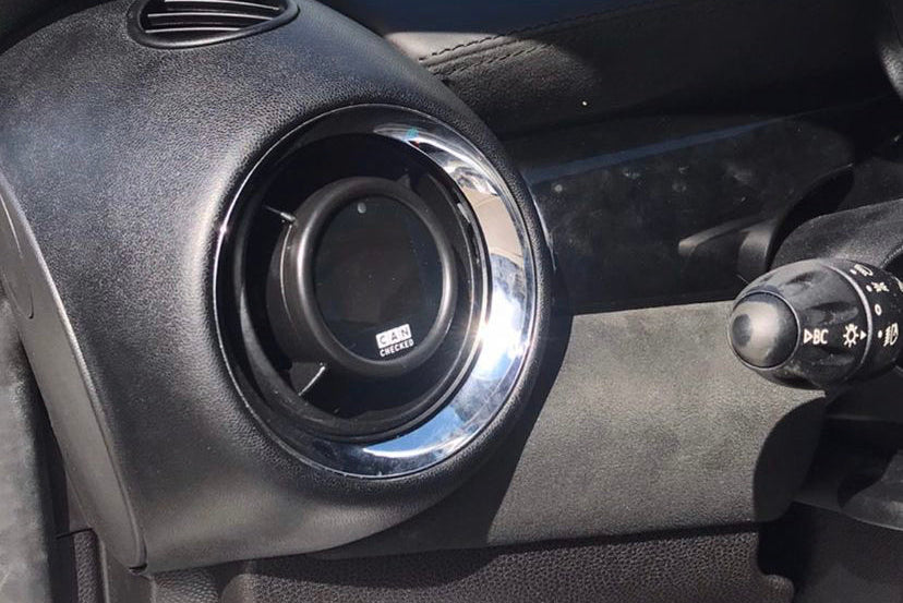 CANchecked R56 MINI Cooper 1.5-inch Gen2 Multi Function Display installed in interior dashboard, showing various vehicle data.