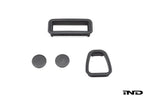 Interior image of the IND E46 M3 CSL center console trim kit showing sleek, high-quality trim pieces on the car's center console.
