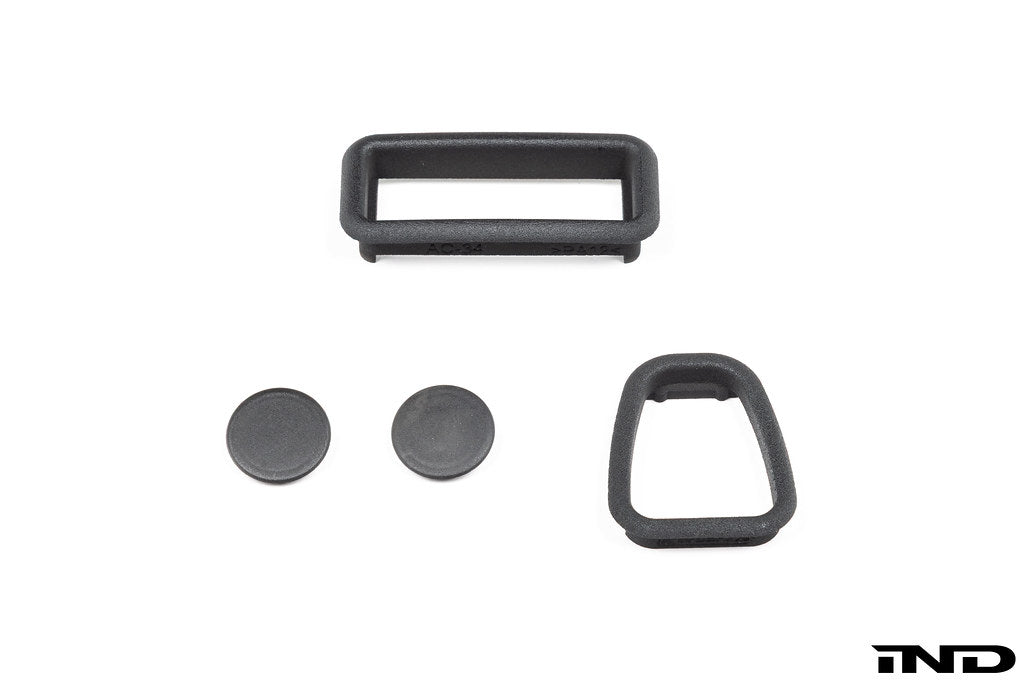 Interior image of the IND E46 M3 CSL center console trim kit showing sleek, high-quality trim pieces on the car's center console.