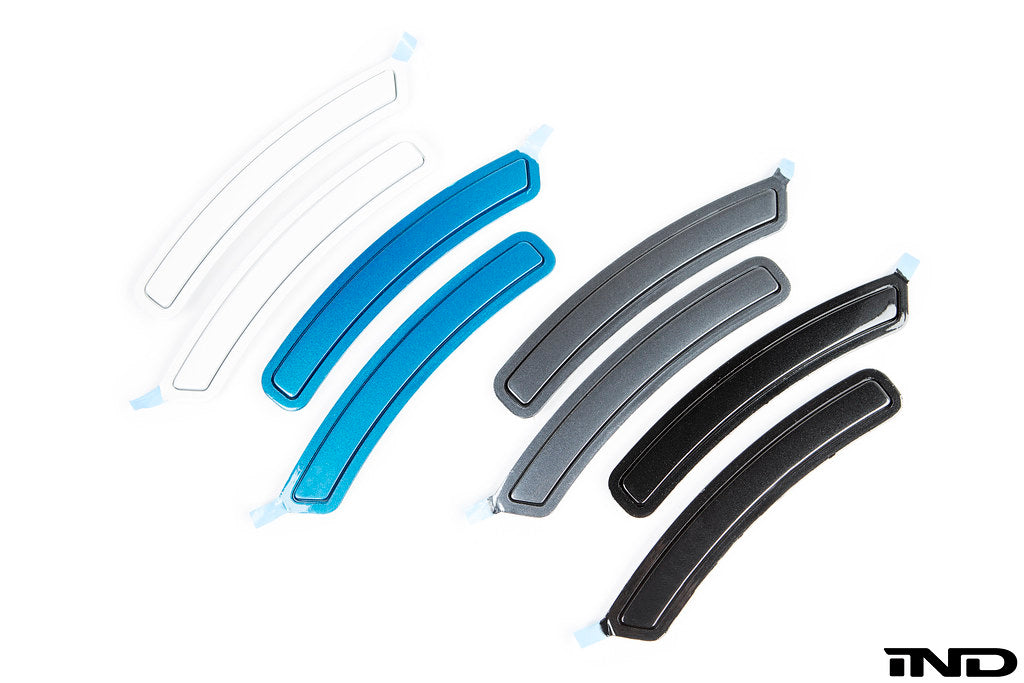 IND IND F87 M2 painted front reflector set for exterior use, showcasing sleek, painted reflectors on a vehicle.