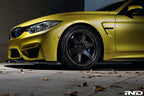 IND F8X M3 M4 Painted Front Reflector Set installed on a BMW F80 M3 or F82 F83 M4, providing a seamless OEM+ appearance by replacing the factory amber front reflectors with color-matched painted units.