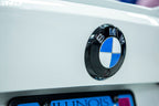 IND Painted BMW Roundel Set Installed Showing High-Gloss Black Surround and OEM BMW Center Emblem on Vehicle