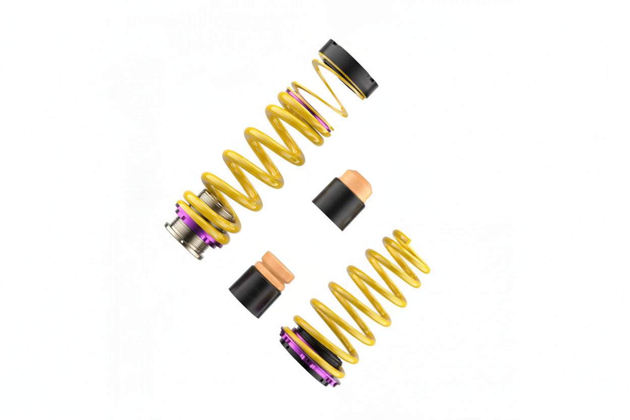 KW adjustable spring kit for Porsche 992 Turbo with yellow springs and black perches on a white background, showing the front vs the rear spring setup.