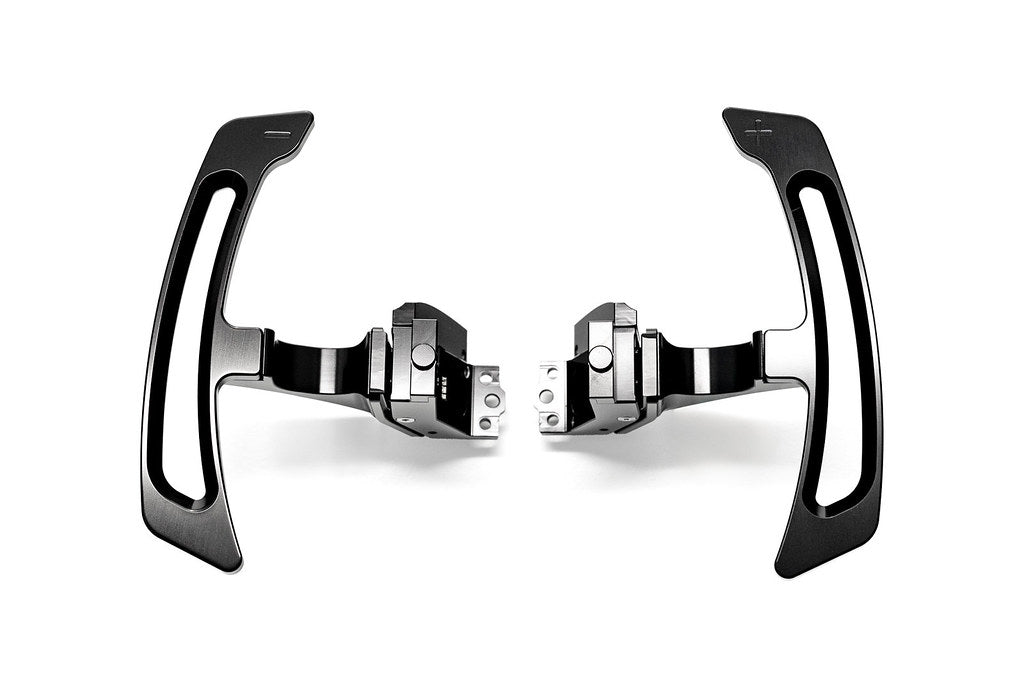 MAED Porsche 911 (992) billet magnetic shift paddle set installed on steering wheel, white background, interior car accessory