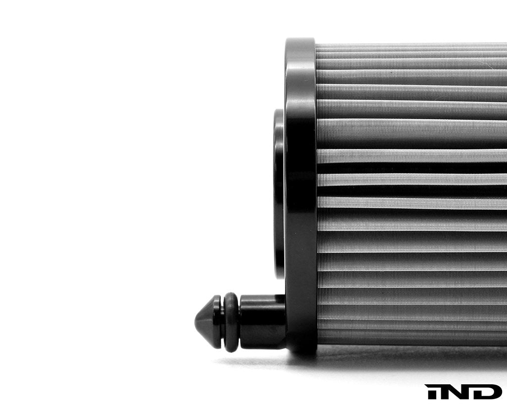 MMX stainless steel lifetime oil filter for BMW S58 engine shown on a white background featuring reusable high-flow filtration design.