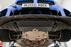 MMX Performance G8X M2 M3 M4 Oil Cooler Guard installed on a BMW G87 M2, G80 G81 M3, or G82 G83 M4, protecting the factory underbody oil cooler from road debris and track hazards while maintaining optimal airflow.