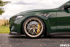 Megachip G8X M2/M3/M4 exterior splash guard set installed on vehicle, protecting wheel wells from dirt and debris.