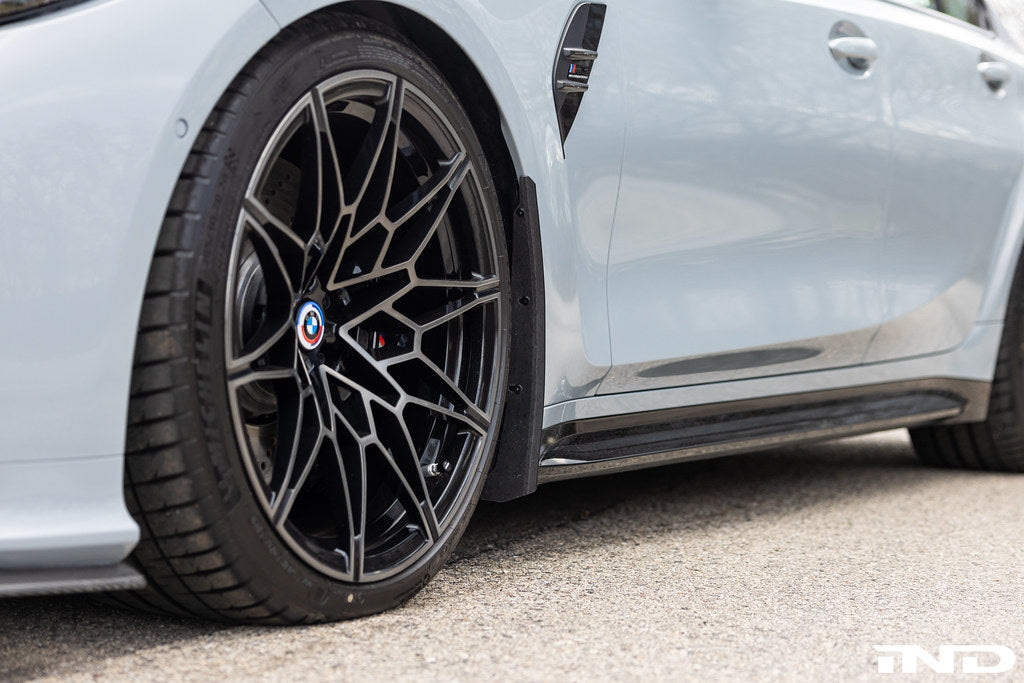 Megachip G8X M2/M3/M4 exterior splash guard set installed on vehicle, protecting wheels from mud and debris.