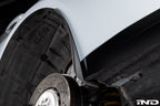 Megachip G8X M2, M3, M4 exterior splash guard set installed on vehicle wheel arch for protection from road debris.