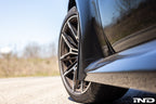 Megachip G8X M2, M3, M4 exterior splash guard set installed on vehicle wheel well for protection against debris.