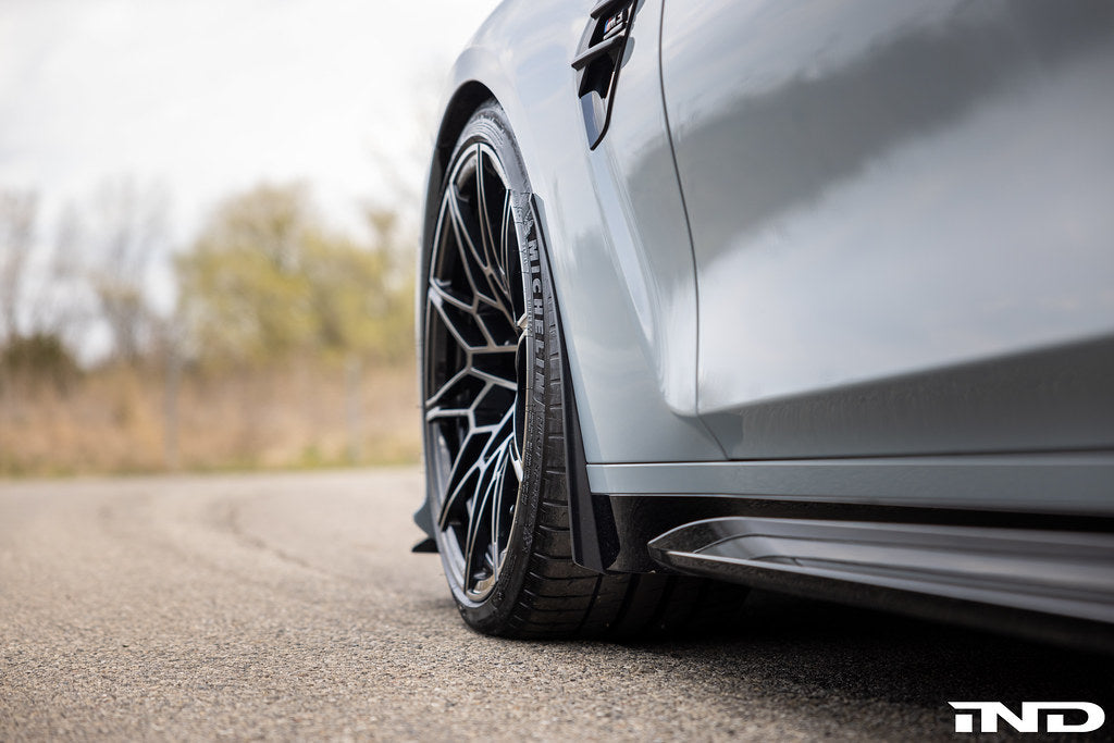 Megachip G8X M2 M3 M4 exterior splash guard set installed on vehicle, protecting wheels and undercarriage from debris and water.