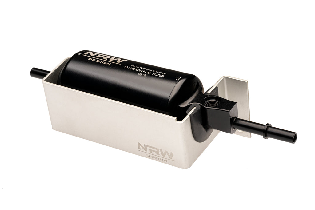 Close-up view of NRW-Design's E9X M3 S65 inline fuel filter housing installed in its bracket